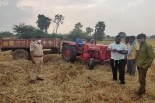 tractor overturns