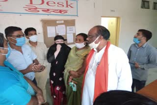 MP during inspection of college