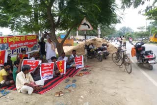 cpi protest to demand panchayat be declared flooded affected area 