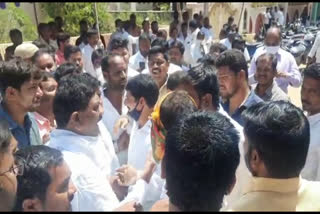 small clash between trs and bjp parties at achampet