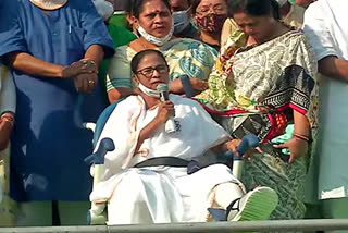 Mamata Banerjee addresses an election rally in Hazra, South Kolkata