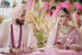 Bumrah with his wife