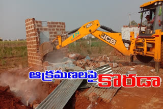 Demolition of illegal constructions in assigned lands at zaheerabad in sanga reddy district