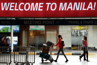 Philippines imposes airport entry restrictions  രാജ്യത്ത് പ്രവേശന നിയന്ത്രണങ്ങൾ ഏർപ്പെടുത്തി ഫിലിപ്പീൻസ്  ഫിലിപ്പീൻസ്  Philippines  മനില  manila  covid  covid-19  കൊവിഡ്-19  കൊവിഡ്  entry restrictions  airport entry restrictions  imposes airport entry restrictions  പ്രവേശന നിയന്ത്രണങ്ങൾ  പ്രവേശന നിയന്ത്രണം  യാത്രാ വിലക്ക്  കർഫ്യൂ  curfew  ലോക്ക് ഡൗൺ  lock down