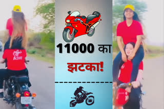 girls caught Stunting on the bike police cut challan of Rs 11000