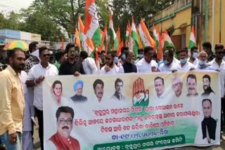 congress demostration on holding tax on berhampur