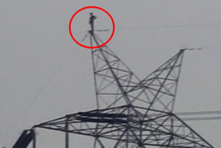 Man climbs up electric tower after girl rejects him