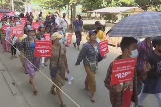 medical professionals demonstrate against the coup in myanmar