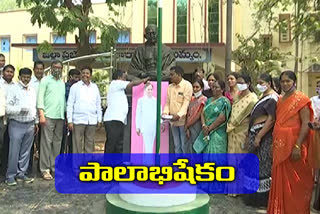 Zilla Parishad employees palabhishekam to CM KCR photo in Khammam district