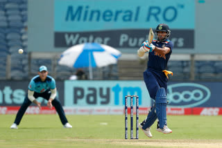 Shikhar Dhawan scores a century in the first ODI against England in Pune