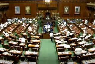 karnataka assembly passes 2 bills amid opposition uproar