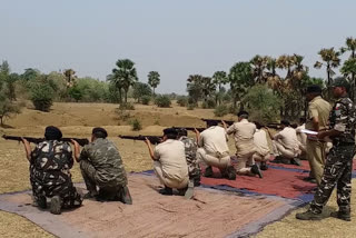 Police officers and jawans aiming at firing rehearsal in Pakur