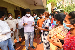 Primary health center staff handing over the petition