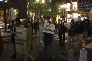 "Stop the Olympics" - Anti-Olympics protesters oppose the games as relay starts