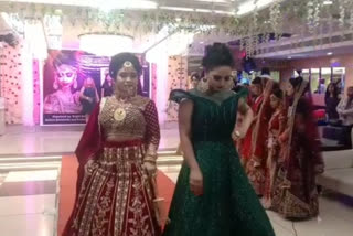 women walk on ramp in beauty contest in Rohini