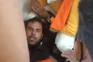Man held for trying to open plane's emergency door