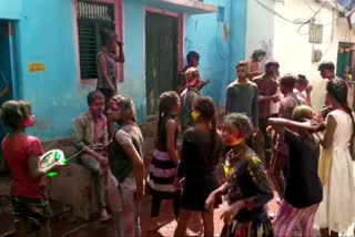 Children playing Holi