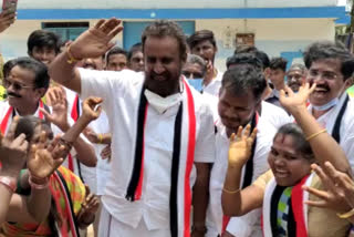 minister S.P Velumani dancing with the tribesmen to collect votes at covai