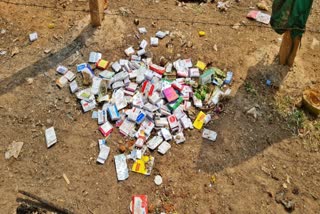 syringe and saline bottles