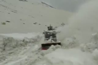 Snow clearance underway on Mughal road near Pir Panjal Mountain Range in Rajouri