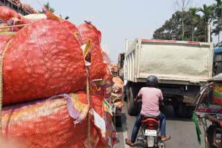 potato loaded truck parked on the road traffic jam in Dinhata coochbehar