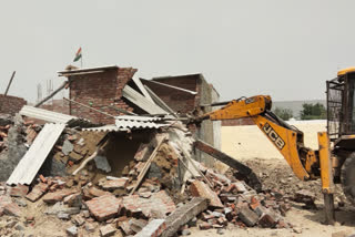 noida authority action against land mafia in noida