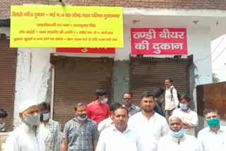 people protest demending close liquor store in ghaziabad