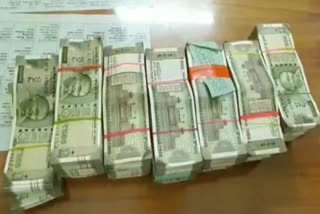 two persons arrested due to distribute cash to voters