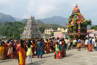 devotees take part in the procession of the Courtalieeshwarar temple car Festival