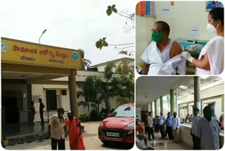 people waiting   for covid vaccine at chodavaram