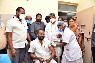 Minister Srinivas Goud takes vaccine along with his family members at mahboobnagar