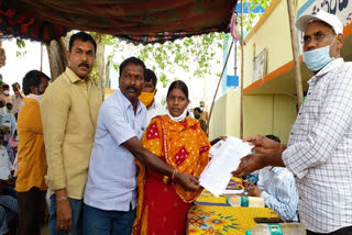 officers meeting with villagers in thadicherla village