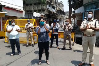 Policemen motivating people on film song