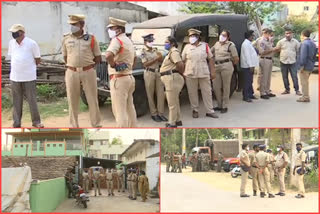 Police deploy at the home of TDP leader Koona Ravikumar