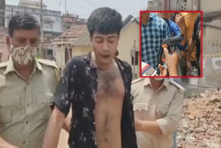 a boy Trying to scare with toy pistol in bankura