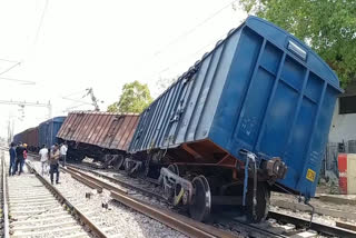 Two coaches of goods train going