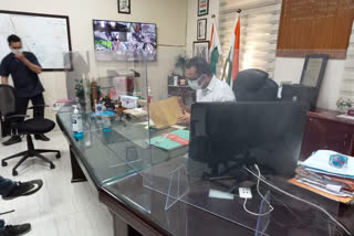 South East delhi DM installed glass protection shield in office