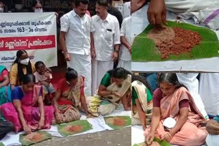 Soil-eating protest  Vishu Day  Cleaning workers strike  front of medical college  'മണ്ണ് തിന്ന് പ്രതിഷേധം  ശുചീകരണ തൊഴിലാളികൾ  കോഴിക്കോട് മെഡിക്കൽ കോളജ്‌