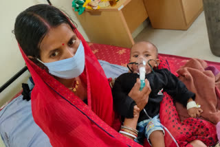 Woman breastfeeds her COVID-positive infant in isolation ward