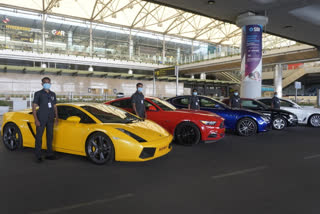 drive home from Hyd airport in Porsche, Lamborghini