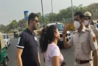 Delhi couple  Delhi couple mibehave with cops  Delhi couple stopped for not wearing mask  Couple stop for not wearing mask  പൊലീസിന് ഭീഷണി  ഡൽഹിയിൽ ദമ്പതികൾക്കെതിരെ കേസ്  മാസ്ക് ധരിച്ചില്ല