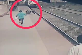 Railway employee races before speeding train to save kid in Thane