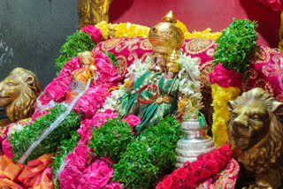 venerations with one lakh flowers to lord lakshmi narasimha swamy