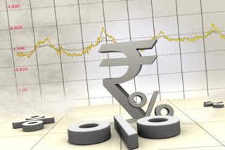 Rupee slumps 52 paise to close at 74.87 (provisional) against US dollar