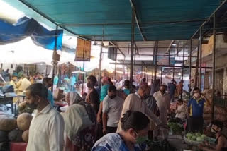 People gathering in Mehrauli vegetable market