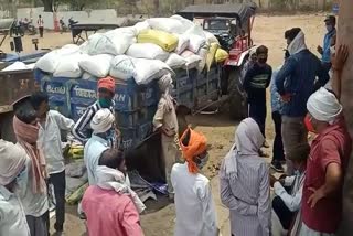 Commotion of farmers at wheat procurement center