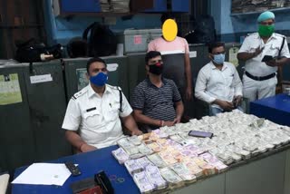 A young man is arrested with approx rs 34 lakh