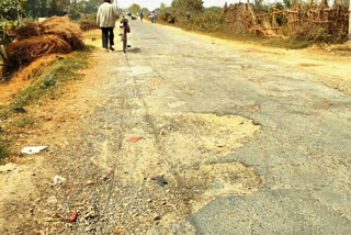 pits on the road in balrampur
