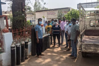 Jain society donating oxygen cylinders