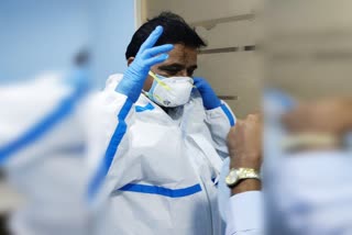 mla-muniratna-check-on-hospitals-wearing-ppe-kit-in-bangalore